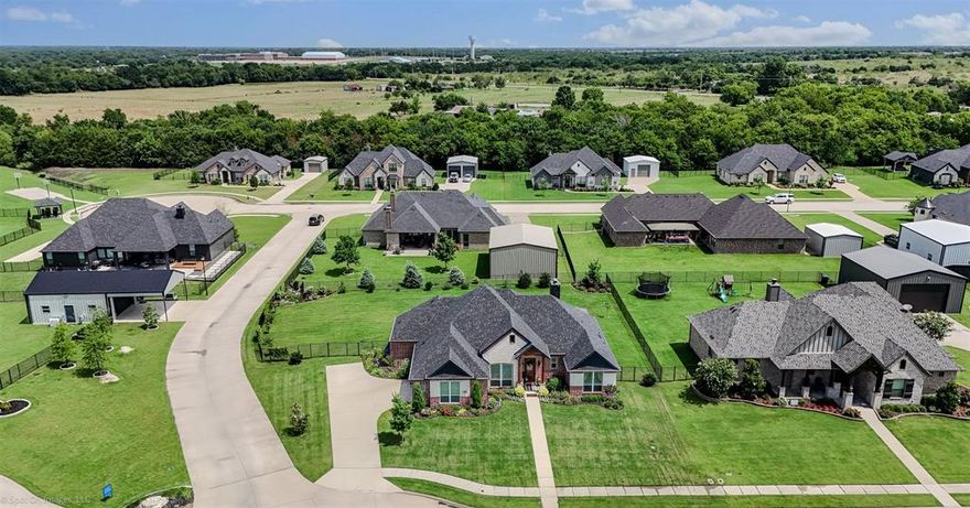 Welcome to this stunning custom-built home, offering the perfect blend of luxury, comfort, and thoughtful design. Situated on a beautifully landscaped 0.48-acre lot, this three-bedroom, three-bathroom residence features an open-concept layout, soaring vaulted ceilings, and rich hand-scraped hardwood floors that flow seamlessly throughout the main living spaces.  Step inside and experience the warmth of abundant natural light that fills every corner of the home, highlighting the craftsmanship and upscale finishes. The gourmet kitchen is a chef’s dream, adorned with sleek granite countertops, high-end appliances, ample cabinetry, and a large island perfect for entertaining or casual dining.
The spacious living area is ideal for both relaxing and hosting, while the dedicated study or home office offers a quiet retreat for work or reading. Each of the three bathrooms boasts granite countertops and quality fixtures, providing both style and function.  The generously sized primary suite offers a peaceful escape with spa-like amenities, while two additional bedrooms provide comfort and privacy for family or guests. A two-car garage adds convenience and storage space.  Step outside to your private backyard oasis, where am outdoor kitchen invites you to enjoy year-round gatherings on the covered patio. The beautifully landscaped yard offers plenty of space for outdoor living, gardening, or just soaking in the tranquility of this exceptional setting.  This home is a true gem—custom, elegant, and ready for you to make it your own.