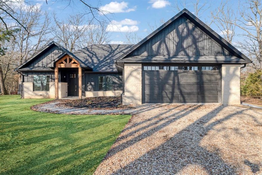 This nearly complete new build offers all the benefits of a custom home with the perfect location, just 5 minutes north of Paris, TX. You get true country living on a huge lot—just over an acre—surrounded by gorgeous, mature trees.

This stunning home features a highly sought-after layout with 3 bedrooms, 2 full bathrooms, and a private office. The open floor plan is bright and airy, boasting elegant 9-foot ceilings throughout and a dramatic, vaulted ceiling in the living room. The kitchen is a showpiece, equipped with custom cabinets, premium granite countertops, a large island, and a full set of brand new stainless steel appliances. Plus, enjoy peace of mind and lower bills thanks to high-efficiency spray foam insulation and modern LED lighting. Outdoor entertaining is easy with a spacious 17x18 deck, and there's a practical true two-car garage. This is your chance to own a modern, efficient, and spacious new home in a quiet setting so close to town!