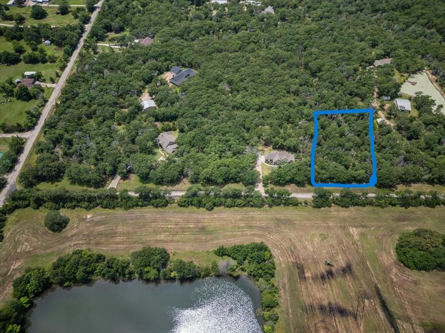 Experience PEACE & PRIVACY on this beautiful secluded wooded 1-acre lot surrounded with nice homes on acreage. Rural tranquility and yet convenient to shopping and nearby park, and Lake Tawakoni is just a few miles away! Easy access to Rockwall on both I-30 and Hwy 276! Water and electricity at street. Surrounded by nature, you’ll enjoy the serenity of country living, yet close to amenities. NO HOA, however, deed restrictions exist to help preserve the area. Plenty of room for RV or boat parking and chickens! No mobiles allowed. Available beautiful white stone and brick home next door also for sale on 1 acre, MLS# 221242008.