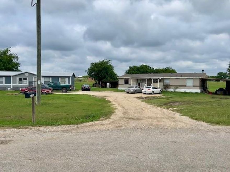 Great investment property with 10 acres and 2 doublewide homes.