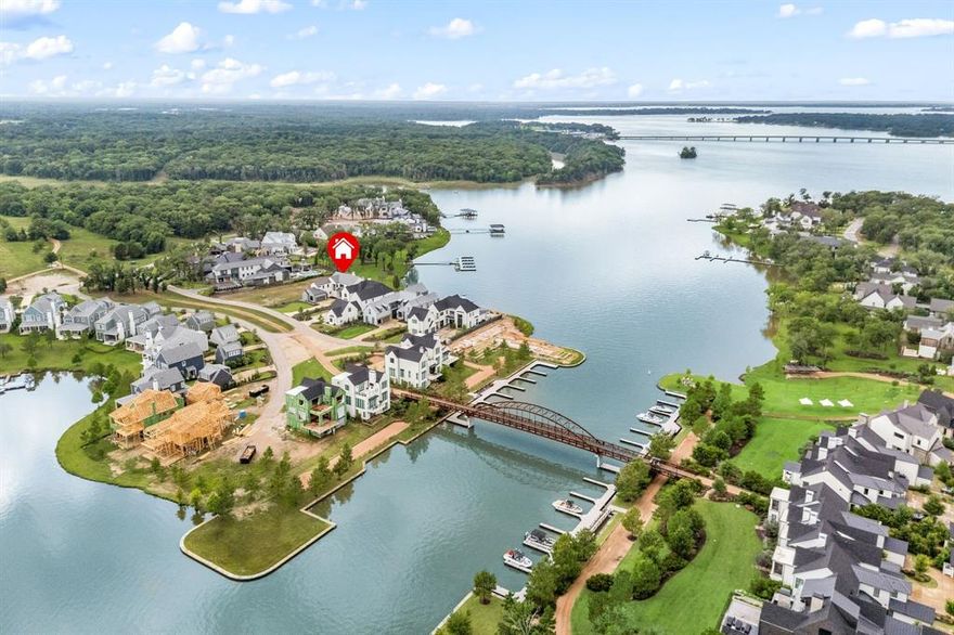 Just over an hour from Dallas, this stunning five-bedroom lakefront retreat in the exclusive Long Cove community offers the ultimate in lakeside luxury.
Perched on the deep, clear end of Cedar Creek Lake, this home combines elegant design with everyday comfort—featuring high-end finishes, expansive lake views, and an open-concept layout ideal for effortless entertaining.
Set within a premier 1,200-acre master-planned community, Long Cove redefines lake living with eight and a half miles of pristine shoreline and an unmatched lineup of resort-style amenities. Residents enjoy access to a bayside infinity pool, adventure park, amphitheater, fitness studio, Lake Club, and Regatta Grill. Sports enthusiasts can take advantage of pickleball, tennis, and basketball courts, a 9-hole golf course, driving range, and even a helipad for convenient travel.
The community is built for outdoor fun and family connection, offering everything from a bike hut and wooded trails to Bluegill Pond, beach volleyball, bocce ball, white sand beaches, and multiple swim coves. Whether you're relaxing fireside with panoramic lake views or spending the day exploring the water, this home is your gateway to an elevated lifestyle.
Ownership comes with full access to resort amenities, including boat valet, docks, and a calendar of curated events, making second-home ownership stress-free and rewarding.
With curated experiences like live music, chef-driven dining, and a strong sense of community, Long Cove turns weekends into lasting memories—and neighbors into lifelong friends.