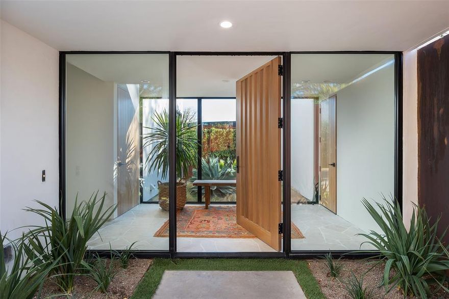 This stunning 3235 sqft California modern home, meticulously designed by architect Paul Field, seamlessly blends elegance and functionality. The primary suite, located on the first level, offers breathtaking views of the private pool and spa, creating a serene oasis. The recent refurbishment includes the kitchen, primary bathroom and closet, new stucco, new garage, new air ducts, vents, and HVAC, lighting and so much more. All of this elevates the home’s aesthetic. Surrounded by a high Corten steel wall, the property exudes exclusivity and security. Its ambiance echoes the chic allure of Palm Springs, infusing the vibrant essence of California into the heart of Dallas.