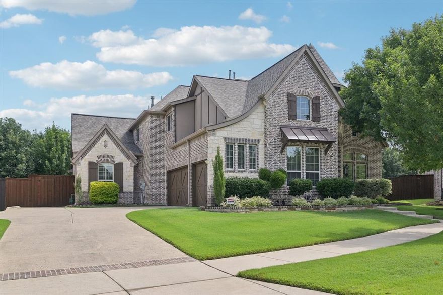 Impeccably maintained and thoughtfully upgraded, this Park Place Estates stunner will impress from the moment you enter with its soaring ceiling and curved wood staircase. The heart of this home is the gourmet kitchen, boasting a stunning Quartzite island with storage. The single granite composite sink, built-in refrigerator, and commercial-grade gas range, double ovens, and large walk-in pantry make it a chef's paradise. The open layout connects to the breakfast nook and living area, facilitating effortless entertaining. The inviting living room features a beautiful corner fireplace, custom media credenza and large windows that provide abundant natural light. The primary suite is a true sanctuary, with a luxurious remodeled ensuite with dual vanities, a freestanding soaker tub, a frameless glass dual headed shower, and a custom closet.  Downstairs also includes a guest suite, full bath, formal dining room and executive office with custom cabinetry, desk and plantation shutters. Upstairs you'll find three spacious bedrooms, two full baths (one Jack and Jill), a game room, and a top-tier media room with bar, mini fridge, laser projector, acoustic wall panels, and 7.1 surround sound system, making movie nights a delightful experience. Step outside to your private oasis complete with a gas fireplace, and ceiling fans-ideal for year-round enjoyment. An impressive pergola houses an outdoor kitchen and bar with seating, perfect for entertaining guests. The heated pool, complete with water features and spa, invites all to unwind. The property includes an oversized three-car garage with epoxy floors, overhead storage racks and a RainSoft full house water softener system. Located in highly rated Frisco ISD and zoned to three top schools: Vaughn Elementary, Pioneer Middle School & Wakeland High School.  This home blends elegance, comfort, and resort-style living.  Make an appointment today to come see this beauty!