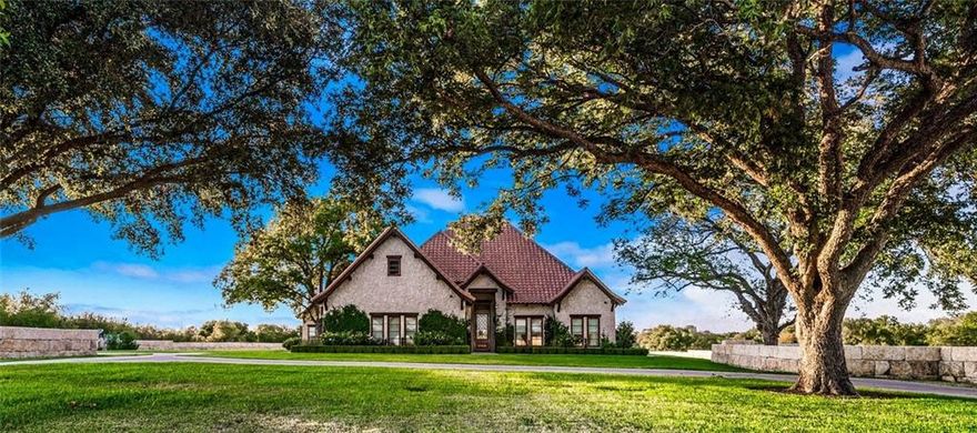 Upon culmination of true inspiration, architectural and aesthetic passion beget an artful creation drawn from the caretaker’s travels around the world where elements of appeal were sourced from some of the world’s most illustrious hotels, residences, and museums. Widely regarded as the most notable architecturally significant home in Central Texas, this French Country estate home reveals painstaking craftsmanship and attention to detail uncommon for the area which were overtly distinctive as a guiding principle from conception to construction of the home. Steeped in an architectural traditional revered for use of finer details such as curved arches, soft lines, and exacting stonework, both the interior and exterior emanate an environment that’s inviting and tranquil, yet sophisticated and rustic; striking the perfect balance of causal and elegant. Old World ambiance and construction techniques ensure that this must be the finest estate home in the Central Texas area. Typically, a home which boasts such architectural significance and perfect planning overshadows the grounds on which it resides. Not here where the setting of this fanciful estate is nothing short of spectacular. The property’s magnificent, manicured grounds offer sight of no other structure enshrining the home in seclusion and privacy rivaling properties with ten times as much acreage. For an additional depth of details regarding the home's amenities and painstaking construction process, please inquire.