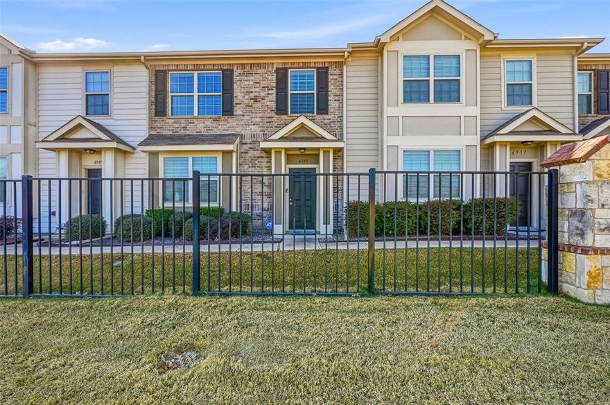 Modern style and unbeatable convenience come together in this 2 bedroom, 2.5 bath, two-story townhome. Ideally situated just minutes from the vibrant shopping and dining at Alliance Town Center, with rapid access to I-35W and Hwy 820, and zoned to Keller ISD, this home keeps you connected to everything the area has to offer. Step inside to the light-filled main level where soaring tall ceilings and a contemporary palette of light paint and sleek flooring create an airy, inviting atmosphere. The first level features a seamless open-concept design, effortlessly flowing from the living room to the dining area and into the kitchen that is equipped with stainless steel appliances. Designed with a thoughtful layout, all bedrooms are tucked away on the second floor to ensure maximum privacy from the social spaces below. The generously-sized primary suite serves as a true retreat, with an ensuite bathroom complete with dual sinks, a relaxing soaking tub, and a separate walk-in shower. Parking and extra storage are no concern thanks to the attached two-car garage. Common features include a community pool. This townhome offers an exceptional lifestyle in a prime North Texas location!