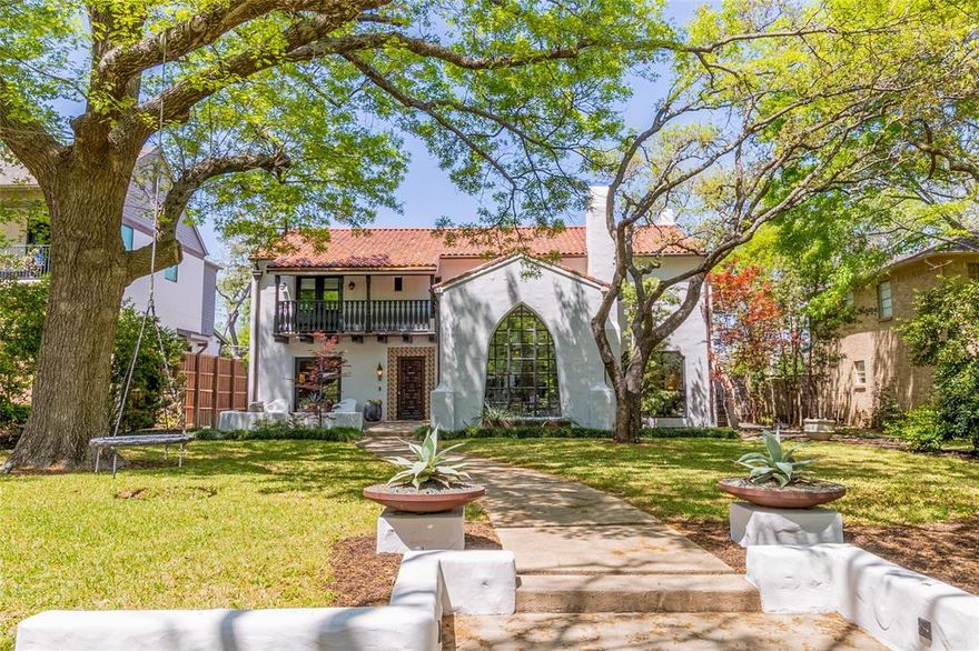 Inspired by the turn of century classic Spanish-Eclectic designs of California & brought to life by the amazing More Design+Build we welcome you to 6955 Lakewood Blvd. Transformed, reimagined, expanded, & finished out like no other home in all of Lakewood to live like fanciful bygone eras with modern amenities & abundant light filled space & flow. Complete with five bedrooms, all with luxurious ensuite baths, central hall design plan with wonderful separation of space to allow privacy for both family & guests to freely move about both inside & outside of this lovely home. The attention to architectural detail & well thought out design is not overlooked from the exterior approach to the multiple vignettes throughout the living spaces. The home centers around & flows in every direction from the most exciting kitchen where even the most learned chef will be inspired, complete with top-of-the-line Viking appliances, center island prep area with marble top, stainless counters, dual dishwashers, prep sink, walk-pantry with additional butler’s pantry; & off the kitchen an amazing wine storage closet! The large primary suite boasts a vaulted beamed ceiling, sitting area with Juliet balcony overlooking the pool & backyard, expansive primary bath with his & her vanities, two water closets, two walk-closets with built-ins & separate shower & soaking tub.  The home also offers guest suite down which could double as a second primary suite with private access to outside living space & fabulous pool. Unique in every way imaginable, located on one of the most sought-after blocks & streets in all of Lakewood & walking distance to both White Rock Lake & Lakewood elementary! This stunning home was previously on the Lakewood Home Tour & also featured as one of The 10 Most Beautiful Homes in Dallas by D Magazine.