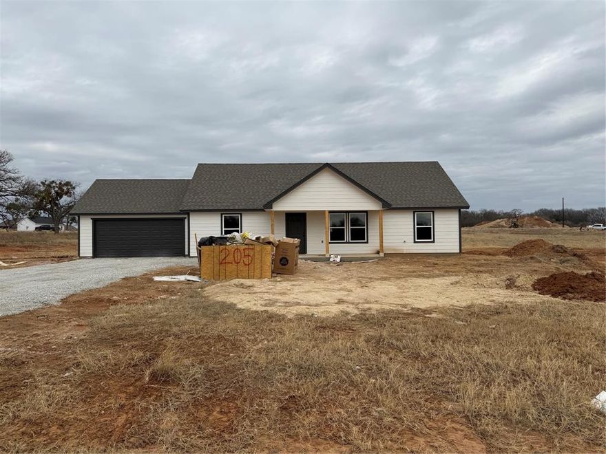 This is a new construction home on 1 acre in Springtown ISD. Come check out this 3-bedroom 2-bath open floorplan home with attached garage in a brand-new subdivision. The kitchen has an island with quartz countertops throughout, custom stained cabinets, and stainless-steel appliances. Master bathroom has double vanities, walk in shower and oversized walk-in closet. Custom tile throughout house and carpet in bedrooms. NO HOA. Ask about builder incentives.