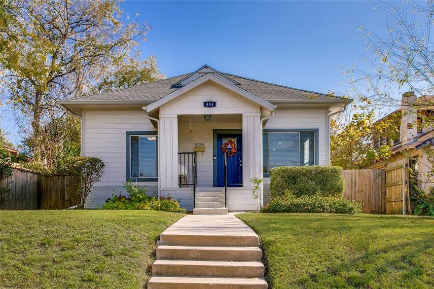 Welcome to 834 S Polk, a bright, stylish bungalow with modern updates and a warm, approachable vibe. Step inside to an open, airy layout featuring sleek wood-look floors, neutral tones, and abundant natural light. The living area flows seamlessly into the updated kitchen, where crisp white cabinetry, granite counters, stainless appliances, subway tile, and a statement backsplash create a clean, contemporary hub for everyday life and entertaining. The primary bedroom is spacious and calming, with room to unwind and recharge, while secondary spaces offer flexibility for guests, a home office, or hobbies. A bonus flex area adds even more versatility, perfect for a playroom, gym, or creative studio. Thoughtful touches like  sliding barn-style doors and modern fixtures elevate the home’s character without losing its charm. Outside, enjoy a fully fenced backyard with a large deck for grilling and relaxing, plus an oversized concrete pad ready for outdoor dining, games, or extra parking. All of this in a convenient Dallas location close to everyday essentials, parks, and city access. Move-in ready, full of light, and designed for real life. This one is easy to love.