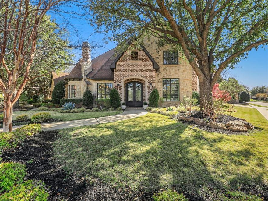 Located in Frisco’s prestigious guard-gated Starwood community, this beautifully updated custom home sits on a quiet corner lot & has been extensively remodeled throughout. Every room has been thoughtfully designed, creating a refined & comfortable living experience. The renovated kitchen serves as the centerpiece of the home, featuring custom cabinetry, generous island space, & a striking floor-to-ceiling glass pivot door that fills the space with natural light & creates a stunning architectural focal point. Miele appliances include an induction cooktop, gas cooktop, convection oven, steam oven, two warming drawers, plumbed coffee maker & large wine cooler, dishwasher, 5 foot galley sink with dual faucets & water purification system with hot water on tap. The home’s layout is ideal for entertaining, with large sliding doors that seamlessly connects the interior living space to the backyard, creating effortless indoor-outdoor living. Step outside to the gorgeous sparkling backyard, which has been completely redone to create a private outdoor retreat. The outdoor space features a pool & spa, covered patios with electronic screens, patio heater,  & built-in mosquito misting system, allowing you to comfortably enjoy the outdoor space year-round. The serene primary retreat includes a sitting area & updated bath with dual sinks, a towel warmer, rain shower with dual shower heads, & custom closet system. The formal living features hidden workspace behind the built-in bookcase. Upstairs, 2 additional bedrooms each offer ensuite baths along with a media room plus a study & living room that could also function as a fifth bedroom with its own sitting room. The garage is equipped with 3 built-in EV chargers, providing convenient charging for multiple electric vehicles. Located near the Dallas North Tollway & 5 minutes or less from Frisco’s premier shopping, dining, & entertainment, this home offers luxury, privacy, & convenience in one of Frisco’s most desirable neighborhoods.