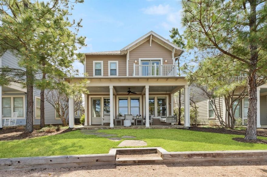 This charming Low Country-style Porch Home offers the lowest entry price in Long Cove—pairing timeless design with thoughtful functionality. A spacious open-concept kitchen and living area creates the heart of the home, while two guest suites and bonus bunks in the upstairs alcove make hosting a breeze. Enjoy tranquil pond views from the oversized front porch or unwind on the private balcony off the primary suite. With a two-car garage and close proximity to all major amenities, this home is move-in ready and designed for effortless lake living.