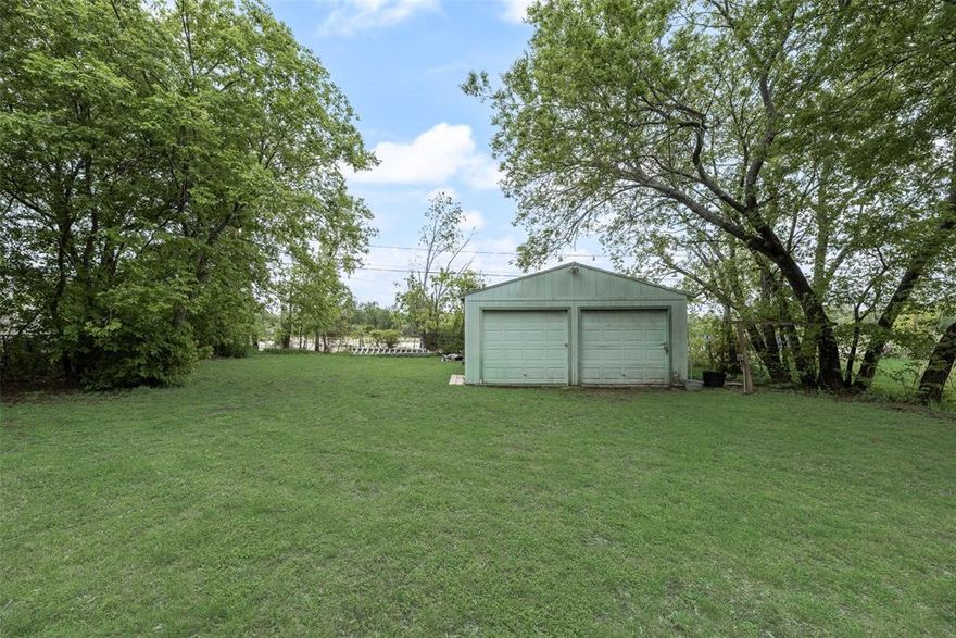 Light, bright, and full of potential in the heart of Lake Worth! This 2-bedroom, 1-bath home offers 1,325 square feet with a functional layout and multiple living that give the home a spacious feel. Situated on an oversized lot with mature trees. Detached 2-car garage (approx. 19x19) with power that would be perfect for a workshop, additional storage, or future customization. This home needs some TLC and is being sold AS IS — seller will not make repairs. Priced accordingly, this is a great opportunity for investors, DIY buyers, or anyone looking to add value and build equity.  Affordable entry point with strong upside, you don’t want to miss this one. Conveniently located just minutes from Lake Worth, major highways, shopping, and dining. Buyer will be responsible for a new survey if needed.
