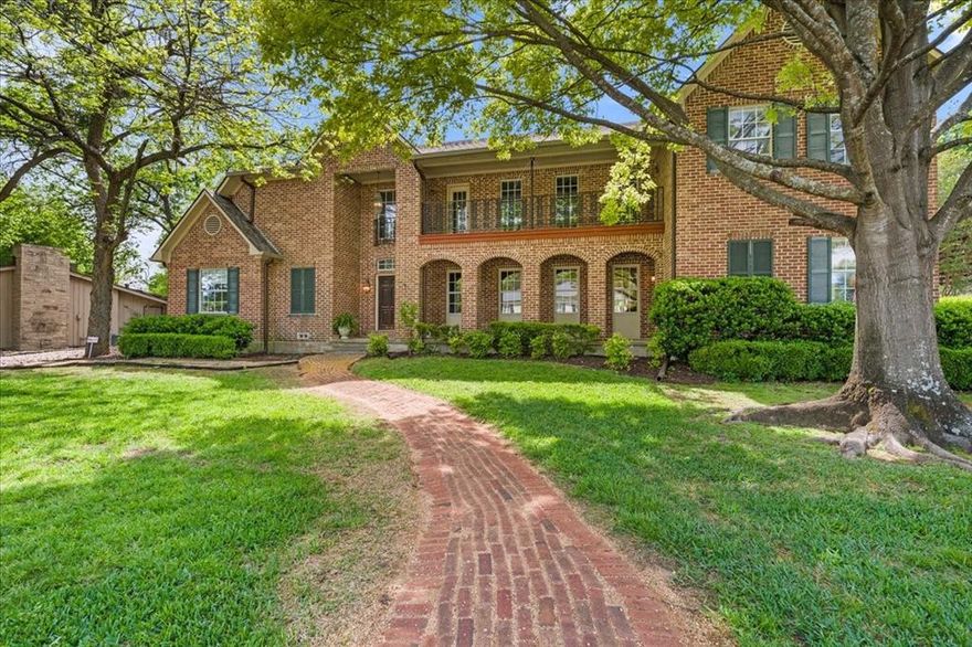Nestled among the majestic trees of the Mills Place Historic District—Corsicana’s most cherished street since 1924—this timeless two-story home offers an extraordinary blend of charm, craftsmanship, and community. Built in 1993 on a treasured family homesite, the property showcases rare pier-and-beam construction, a hallmark of durability. Step onto the welcoming front porch, inside you’ll find a sitting room with soaring beamed ceilings that flows seamlessly into the formal dining and spacious family rooms. At the heart of the home, a stylish bar serves as the perfect hub for entertaining. The family room invites you to relax by the fireplace, play games, or enjoy movie night, all while opening onto a backyard oasis. Out back, the covered patio is an offers ample space for alfresco dining, grilling, and unwinding as you soak in the serene beauty of the .6-acre lot. The well-appointed kitchen features a wraparound breakfast bar, custom cabinetry, a built-in 48in stainless refrigerator, and walk-in pantry. The breakfast room is a casual spot to dine with tranquil backyard views. On the main floor, the primary suite boasts a spacious bedroom, sitting area, and bath featuring dual vanities, a jetted tub, separate shower, and walk-in closets. A second bedroom and bath are ideal for guests, while a cozy den off the kitchen creates a space to relax or work. Upstairs, a versatile loft opens onto a charming balcony, perfect for taking in the happenings on Mills Pl. Two large bedrooms share a bath with private vanities. The expansive attic offers great storage or potential for additional living space. Living here means becoming part of a rare and close-knit community that celebrates life together with traditions like a Christmas tree lighting, Halloween parties, Good Friday services, and gatherings like Mills En Blanc and happy hours. With superior craftsmanship, an open floor plan, and a location steeped in history and neighborly charm, this property is truly one of a kind.