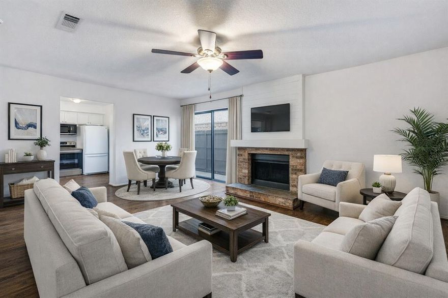 Welcome to this move-in ready 2-bedroom, 2.5-bathroom condo in the highly desirable Wellington Place community in North Arlington. Enjoy community amenities including a swimming pool and clubhouse, all within walking distance to the elementary school. You’ll also have easy access to shopping, dining, major highways, River Legacy Park, the Arlington Entertainment District, and UTA. Step inside to a bright, freshly painted unit with refinished wood flooring to the main living areas and new carpet. living room features a wood-burning fireplace. A powder bath is perfect for guests. The formal dining room flows to a kitchen with white painted cabinets, granite countertops, and stainless-steel appliances. A convenient laundry closet with stackable washer and dryer conveys with the sale. Upstairs, you’ll find a landing with built-ins for extra storage and two spacious bedrooms, each with en-suite bathrooms and walk-in closets. This home also includes an assigned covered parking space ‘S73’.