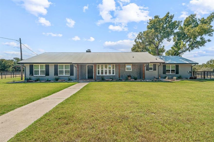 Welcome to the country retreat you've been dreaming of. This completely updated Farm House on 2 Acres with Pool, Shop & Lean-to for extra parking or equipment shed, is one you don't want to miss. Surrounded on all 3 sides by privately owned and undeveloped acreage, you will love the privacy this property enjoys. This immaculate 3 bedroom, 2 Bath Home has been beautifully remodeled and it is stunning, with vaulted ceilings in the living area, a charming fireplace, open kitchen with quartz countertops and all new appliances.  A wet bar and a wall of windows across the back to take in the view of the pool, the fire pit and the countryside put a bow on this exceptional package and make it ideal for entertaining family and friends. Outside you will love the huge covered porch overlooking the back yard pool, and don't miss the newly built fire pit, the perfect gathering spot for evenings around the fire and since there are no street lights in the country the stars gazing will be amazing.  The property is fenced and cross fenced, and boasts an almost new Shop Building with overhead door and electric service.  There is also a large lean to on the property ideal for additional parking or for an equipment shed.  No Deed restrictions, No City Taxes, this truly is a country showplace.