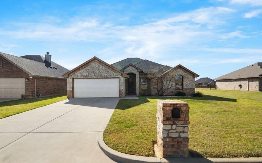 Welcome home to this charming 4-bedroom, 2-bath brick and stone beauty nestled in the sought-after Parkview Place subdivision in Tolar, TX. Step inside to an open floorplan filled with natural light, ceramic tile flooring, and tasteful finishes throughout. The kitchen is a standout with granite countertops, an eat-in dining area, and a pantry and is ideal for everyday living and entertaining alike. The primary suite offers a peaceful retreat with a walk-in closet and private bath, while three additional bedrooms provide flexibility for family, guests, or a home office. A full-size utility room adds everyday convenience.

Step outside and experience the true heart of this home — an extended covered patio complete with its own outdoor fireplace, creating the perfect space for year-round entertaining, quiet mornings, or cozy fall evenings under the stars. The fully fenced backyard opens to a lush greenbelt, extending your outdoor entertaining space and offering privacy.

The community is really something truly special. Parkview Place sits right on the Tolar parade route, making holidays an unforgettable experience from your own front yard. The neighborhood comes alive at Halloween with kids trick-or-treating street to street, and the tight-knit community feel here is something you simply can't put a price on. This is the kind of neighborhood where neighbors become friends and memories are made year after year.

Come see why life is just better in Tolar!