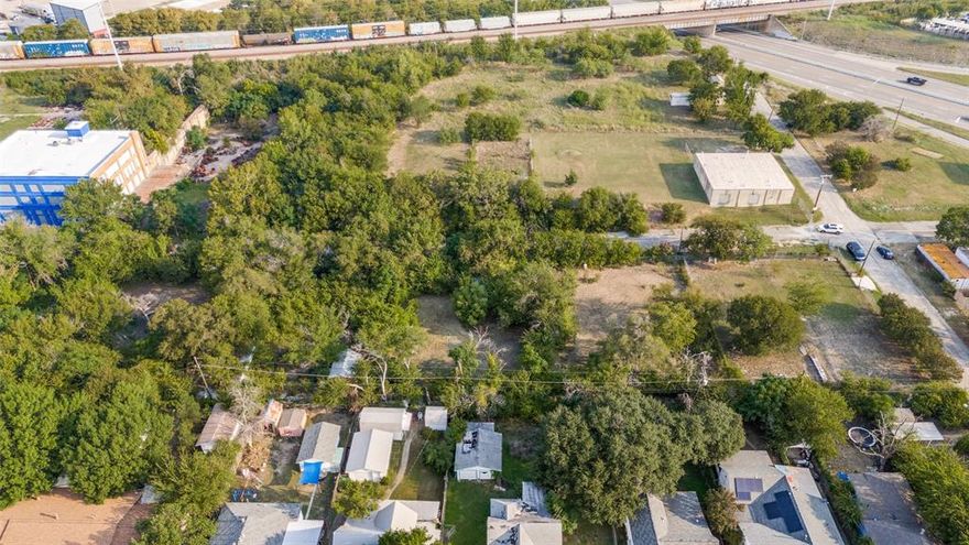 Vacant Lot easily accessible to IH-30, US-287 and IH-35W. Build a house to call home on this tree lined lot. Buy the lot right beside it and have even more space to enjoy. Opportunity to purchase the entire street is available with a total of 8 lots. The City Councilman, Chris Nettles, will be working with the potential buyer or developer regarding some necessary infrastructure needed. Reach out to listing agent for more information.