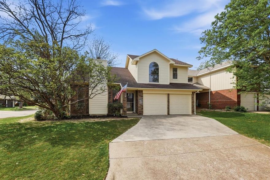 Situated on a desirable corner lot and zoned to sought-after Mansfield schools, this charming 3-bedroom, 2.5-bath home is full of opportunity and ready for your personal touch! Upstairs, the spacious primary suite features two closets and a private ensuite bath with dual sinks, with an additional full bath upstairs and half bath downstairs that provides plenty of convenience for family or guests. The main living area welcomes you with vaulted ceilings and a cozy wood-burning fireplace, perfect for relaxing or entertaining. Step outside to enjoy the generously sized backyard, complete with an open patio and mature trees that create a sense of privacy and tranquility. Recent updates include fresh interior and exterior paint, new garage doors, and freshly mulched landscaping. The seller is willing to replace the roof with an acceptable offer, adding even more value and peace of mind. Don’t miss the chance to make this home your own!