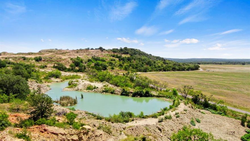Beautiful expanse of land located in the Palo Pinto hills right off I-20 a short drive to Gordon. The property is currently an active cut stone quarry of sandstone rock. The quarry is a multi generation reserve with hi quality ASTM stone that meets all criteria for building, architectural, & retaining wall stone. All permits & licenses are in place to continue operation for new owner. Equipment is available for separate purchase. This 326-acre property is situated among rolling hilltops with stunning views of the surrounding area. The land is mostly wooded, with a mix of hardwoods & pines. Several wet weather creeks run through the property, providing excellent habitat for wildlife. This property would be perfect for a variety of uses, including hunting, fishing, camping, or simply enjoying the peace & quiet of the country. Stunning views would also provide some great homesites. This kind of multi use property does not come along often so CALL TODAY FOR YOUR PRIVATE SHOWING.