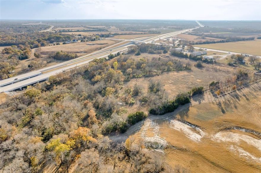 Great investment opportunity in Blue Ridge, Texas with instant rental income of 11,100 monthly.  Future development potential on 18.36 acres with road frontage on State Highway 160 and State Highway 121. Completely fenced and gated. There are 3 shops that were built in 2019, 2021 and 2024 with square footage of 2400, 3200 and 5000 sqft. Each shop has office space and bathrooms. Currently holding 4 tenants with 2-5 year terms. Utilities include Desert Water, Constellation Electric and Aerobic Septic's. Shopping and restaurants close by. 15 minutes east of Melissa, Anna and Interstate 75.
