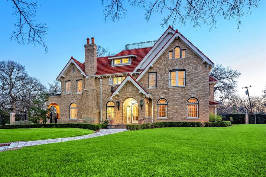 Experience the allure of this magnificent estate called Villa Vista that is perched atop of one of Dallas's highest peaks. Set on an expansive acre & built in 1925, this exquisite residence boasts only 3 discerning owners over its 100-yr history. Adorned w-meticulous brickwork & architectural details the exterior grants captivating vistas of downtown Dallas. This property showcases a custom pool, English garden, 3-car garage & guest suite. Step inside to a sanctuary of luxury blended w-timeless charm. Impeccably renovated to today's standards, this home exudes elegance w-original hardwoods, large living areas, a chef's kitchen w-butler's pantry, custom lighting, surround sound & intricate finishes. Spanning over 5,700 sf plus a finished basement, this residence offers ample space for entertaining. 3rd level features a versatile game room @ the crowning feature is a rooftop deck - a Widow's walk, giving unparalleled 360-degree panorama of Dallas's skyline.