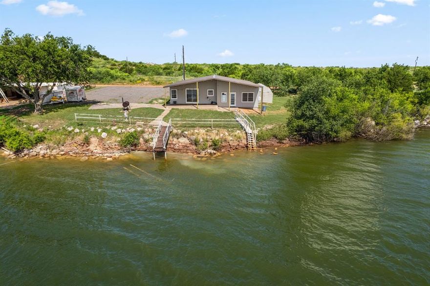 Fully Remodeled and partially furnished Lake Kemp getaway on rare DOUBLE lot! Sleeps 12+ with 2 bedrooms plus an additional bunk room. Remodeled in 2023 - 2024 with new electrical wiring, water heater, vanity, toilet, sink, drywall, flooring, paint, and more. Property includes covered patio perfect for entertaining, and large storage shed. Amazing views and GREAT neighbors. Just 45 minutes to Wichita Falls, 2.5 hours to DFW. $100 per year HOA. Moonshine neighborhood is long term lease from adjacent Waggonner Ranch.