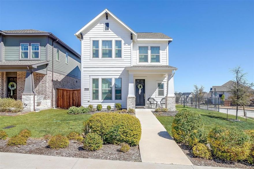 Welcome to 14300 Walsh Ave, a beautifully designed modern farmhouse located in the highly desirable Walsh Ranch community. This upgraded home sits on a premium corner lot within walking distance of the top-rated Walsh Elementary School. Inside you'll find thoughtful upgrades throughout, including engineered hardwood flooring, a luxurious garden tub, designer wallpaper, and high-end mirrors and light fixtures that enhance the home’s stylish character. Plantation shutters allow natural light to flood the open-concept living space, creating a warm and inviting atmosphere.  The gourmet kitchen features granite countertops, ceiling-height custom cabinets, a commercial-grade cooktop, and a classic farmhouse sink—perfect for both everyday meals and entertaining guests. The floor plan includes a downstairs primary suite for convenience and privacy, with three additional bedrooms upstairs, along with a second living area or playroom and a built-in office space, ideal for remote work or study.  The backyard offers ample space for pets, including a dog door and enjoying gatherings and cookouts with guests. As part of the Walsh community, residents enjoy access to resort-style amenities including two pools, a fully equipped fitness center, a makerspace, multiple parks and playgrounds, hiking and biking trails, and a lake with a fishing dock. The HOA also covers front yard maintenance, high-speed internet, and access to a robust calendar of resident activities, making this home the perfect blend of comfort, convenience, and community living.