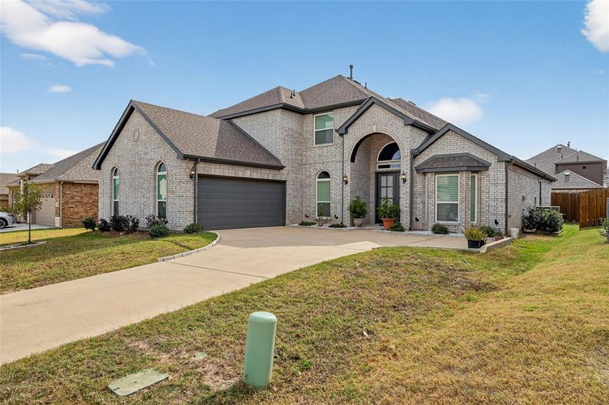 Closing Cost assistance  - Refrigerator + washer & dryer are included for this Stunning 4-bedroom, 4-bath First Texas Homes beauty—perfect for multigenerational living with a private upstairs in-law suite and full bath! Built in 2022 and loaded with upgrades, this home features soaring ceilings, Gorgeous wood flooring, quartz countertops, custom trim, and elegant iron stair railings. The chef’s kitchen shines with double ovens, a 5-burner cooktop, custom cabinetry, a spacious walk-in butler’s pantry, and plenty of room to entertain. Retreat to the luxurious primary suite with dual vanities, an oversized shower, garden tub, and a large walk-in closet.
Enjoy movie nights in the downstairs media room complete with a wet bar, mini-fridge, and projector wiring. Bonus upgrades include security cameras, a full sprinkler system, tankless water heater, and striking exterior stone accents. Barely lived in, exceptionally maintained, and still under the structural builder warranty. Bring your offer today!