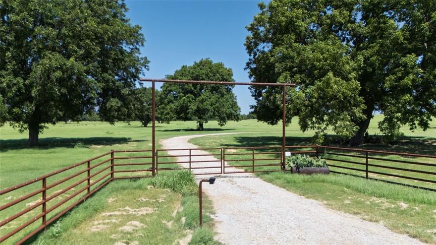 Discover a rare opportunity to own a meticulously upgraded 202 acre estate in Wise and Montague County. Serene and beautiful and one hour from DFW, minutes from Decatur. More than a property, it's a turnkey legacy ranch and recreational paradise thoughtfully enhanced for both luxury living and serious production, and within walking distance of the LBJ Grasslands.
The newly constructed premium 60x100 steel shop features a spacious 1,200 sf finished barndo with a rustic farmhouse feel and a 50 ft expansive covered porch. It includes 2 bedrooms, 2 baths, and full kitchen. Some furniture and appliances are included, making this property truly turnkey and move-in ready.  
The shop hosts a storage area and large workshop, which was built for future use as an airplane hanger, and adjacent to the proposed runway. This property includes all the necessary equipment: Kubota 70HP tractor and primary implements, Kawasaki Mule, zero-turn mower, air compressors, tools etc. It also offers nearly 5,000 ft of Parker Dairy road frontage and three access gates. Starlink and CCCT cameras are operational and included.
Ranchers! 185 acres of premium pasture, can produce over 2,000 large bales per season of premium coastal Bermuda, well-fertilized and weed-killed.Fully equipped for a cattle operation, with premium perimeter fencing, cross-fencing, cattle pens, three large year-round water tanks, and two high-output electric fully operational water wells.
Outdoorsman, additionally, a 500 yd shooting range with five steel targets at 100 yd increments, including incredible hunting opportunities on 17 acres of raw hunting land crossing and bordering Denton and Panther Creek. Teeming with wildlife, inc deer, hogs, and birds.
Underground electricity, no power lines to obstruct your views. Pecan trees add to the beautiful scenery and endless possibilities for use, inc Airbnb, weddings, development, or a hunting lease, make this versatile and upgraded ranch ready for its new owner.