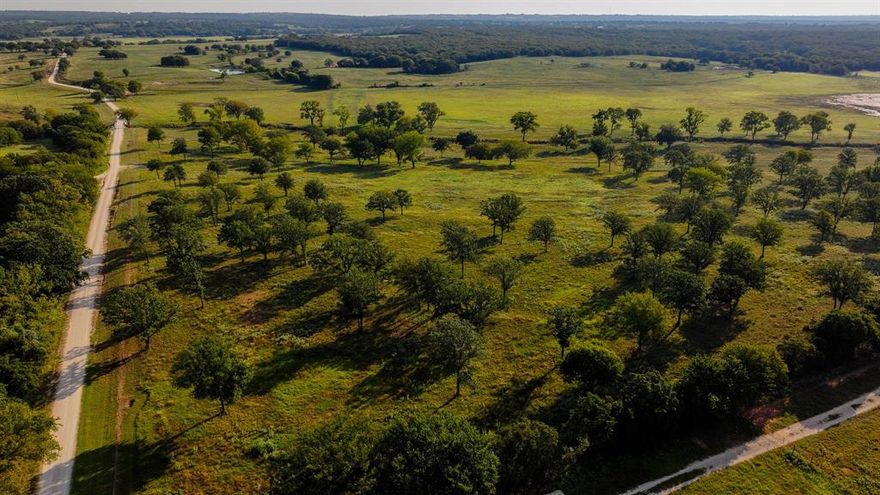 *Drone video available* 

Whitetail Properties proudly presents the Mallard Ranch—421.38 acres in Montague County, Texas. Located at 675 Hundley Rd, this turnkey ranch offers a prime blend of livestock functionality and recreational appeal. With over 150 acres of improved Bermuda grass pasture and 65 acres of native hardwood timber, the property supports both productive grazing and abundant wildlife, including Whitetail deer, turkey, and feral pigs. Gently rolling topography and sandy loam soils enhance usability and aesthetics, with elevations from 950' to 1,020'.

Mallard Creek runs through the ranch for over 2,200 feet, complemented by a seasonal creek and nine ponds, several stocked for fishing. A 168-ft well produces 12 GPM, servicing the ranch alongside multiple heated troughs.

The ranch features 6-strand barbed wire perimeter fencing, cross-fenced pastures, and an exceptional set of working pens with water and electricity. An electric gate and pipe gate secure access, and a 2-acre high-fence garden with drip irrigation offers potential for orchards or vegetables. Additional improvements include an equipment shed for storage.

With frontage on both Hundley Rd and FM 455, the property is conveniently located near Montague, Bowie, and Decatur, offering quick access to major routes and cities like Fort Worth and Dallas. This is a clean, well-managed ranch ideal for cattle, horses, or recreation—ready to go from day one.

Some deed restrictions will apply, with subdivision restrictions being the main focus. Call for details.