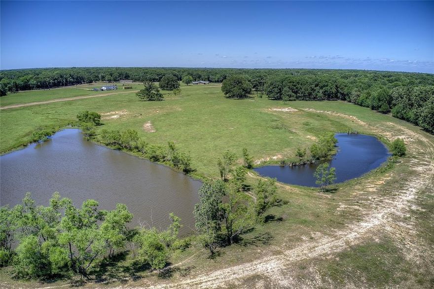 Discover a rare opportunity to own a 308-acre East Texas ranch that perfectly blends ranching and recreation. Nestled in northern Hopkins County, this exceptional property offers a move-in-ready home, allowing you to immediately settle in while providing ample space to expand your vision for generations to come.

With a diverse landscape of open pastures and mature mixed timber, this ranch creates the ideal environment for both livestock and wildlife. The well-maintained grasses offer prime grazing for cattle and horses, complemented by cross-fencing for rotational grazing, working pens, and a hay meadow. Five stocked ponds ensure a steady water supply, while a hay barn, pipe-fenced roping arena, bucking chutes, and spectator seating make this property a turn-key ranching and equestrian retreat.

Beyond its agricultural appeal, the property boasts exceptional road frontage, multiple prime building sites, and on-site electricity, offering endless possibilities for expansion. Whether you envision a private ranch estate, an equestrian facility, or a recreational retreat, this land is ready to bring your vision to life.

Located just one hour east of the Dallas-Fort Worth Metroplex, with easy access to I-30, this ranch combines the best of rural living with modern convenience. Don't miss this chance to own a versatile, income-producing, and scenic Texas retreat—a place where your legacy can thrive for generations.