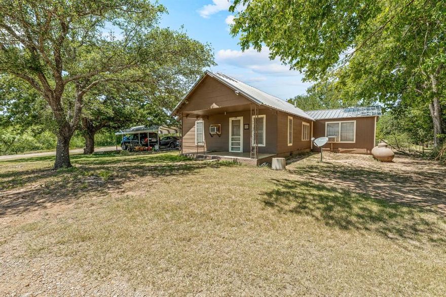 Take a look at this super cozy home situated on just under 4 acres, located just minutes southwest of downtown De Leon, TX, accessing amenities like good eats, grocery stores, and shopping are easily accessible while also keeping that quiet county living. This 2-bedroom 1bathroom home has had several updates throughout the years including electrical, interior wall upgrades, flooring and many more. There is an attached shed that has been closed in and insulated to create a very neat game room or activity room, it could easily be additional living if someone needed more living space. This property has so much potential so don't miss your chance to take a look, it will not last long.