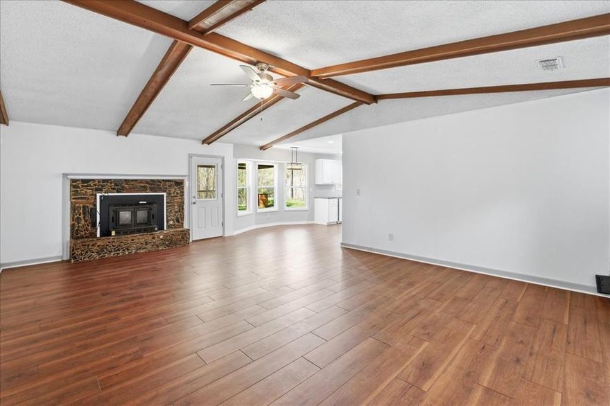 PRICE REDUCED!! Lake Life Meets Modern Comfort! Welcome to the desirable Lake Brenda community of Mineola, where beautifully updated living meets the lifestyle East Texas is known for. This stunning 3-bedroom, 2-bath home with 1,590 square feet has been thoughtfully updated and is within walking distance to the private community lake, making it perfect for those who love peaceful mornings, evening walks by the water, and relaxing weekends outdoors.

Step inside to a warm and inviting living space featuring a cozy wood-burning fireplace, perfect for gathering with family or enjoying quiet nights at home. The fully remodeled kitchen shines with gorgeous granite countertops, modern finishes, and updated cabinetry, creating a space that’s both stylish and functional. Both bathrooms have been beautifully remodeled with tile finishes, while durable laminate flooring runs throughout the home, complemented by new lighting fixtures that give the interior a fresh, modern feel. An installed alarm system adds an extra layer of comfort and security.

The exterior offers a rare and highly desirable feature: rear access from Highway 37 to the spacious backyard, making it incredibly convenient for parking boats, RVs, campers, trailers, or recreational vehicles. Whether you’re an outdoor enthusiast or simply want extra space and flexibility, this property delivers.

Location is everything—and this one truly has it all. Enjoy walking access to the private Lake Brenda community lake and be just a short drive from world-renowned fishing at Lake Fork, one of Texas’ most popular destinations for anglers and lake lovers alike.

If you’ve been searching for a move-in ready home that blends modern updates, outdoor lifestyle, and lake community charm, this property checks every box. Come experience the best of East Texas living