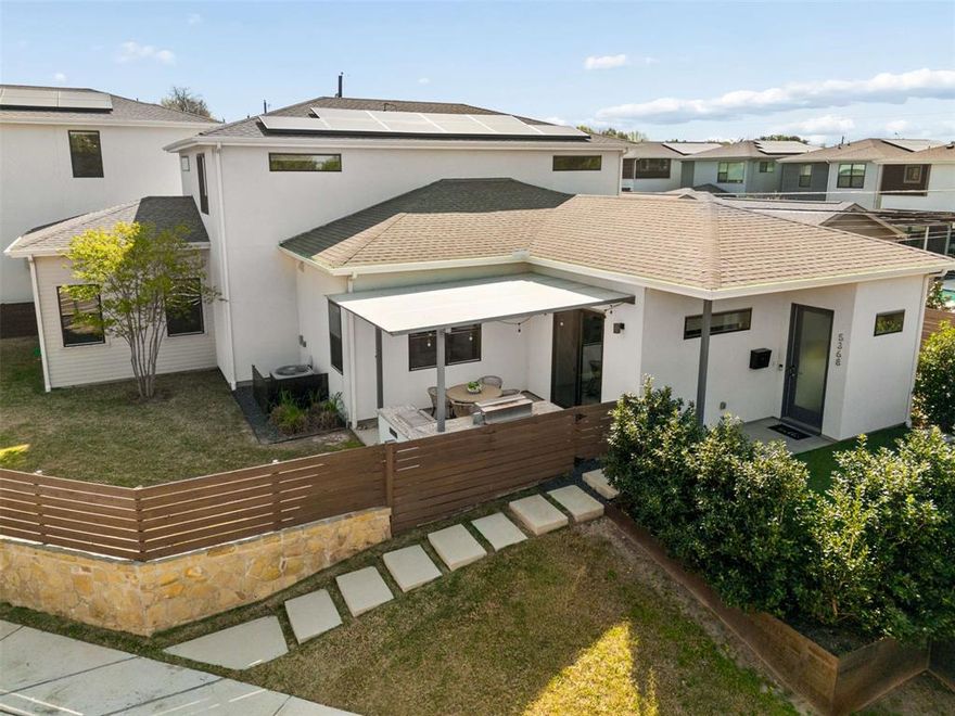 Set on a prominent corner lot in sought-after Glencoe Terrace, this beautifully designed 4-bedroom home offers the perfect balance of modern comfort, thoughtful design, and exceptional indoor-outdoor living just minutes from SMU, White Rock Lake, and Greenville Avenue.
Inside, expansive windows fill the open-concept living spaces with natural light, creating a bright and welcoming atmosphere. Clean architectural lines and a seamless flow connect the living, dining, and kitchen areas—ideal for both everyday living and effortless entertaining.
The spacious first-floor primary suite offers a private retreat, complete with a large walk-in closet and a well-appointed dual-vanity bath. Upstairs, three additional bedrooms provide flexible space for family, guests, or a home office.

Outdoor living is a true highlight of the home. The extended covered patio—built with a steel frame and durable Polygal roofing—anchors a fully equipped outdoor kitchen featuring a premium Memphis Elite grill and smoker, Duro side burner, granite countertops, stainless storage drawers, and tile flooring. The leveled main yard creates a highly usable outdoor space, while the turf-lined side yard and charming courtyard offer additional areas to relax or entertain.
Additional thoughtful upgrades include a custom built-in mudroom, overhead garage storage, and an Emporia EV charger.
Located just steps from Glencoe Park and zoned to Mockingbird Elementary, the home also offers walkable access to Mockingbird Station, Greenville Avenue’s vibrant dining and shopping, and convenient connections to the Katy Trail. With Downtown Dallas only minutes away, this home delivers the best of urban convenience in one of East Dallas’s most desirable neighborhoods.