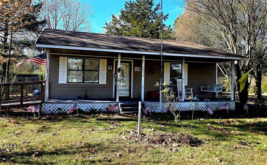 Come and see how peaceful this land is, bring your horse and find the peaceful comfort of country living in a small community outside the city limits. This property has the perfect amount of beautiful trees. Imagine coming home and just dropping a fishing line line in your very own pond or take a stroll and enjoy your own open space to roam and decompress for the day! This is in a neat area of Terrell nestled within a country setting. Most homes averaging a minimum of two acre lots or more. The home has cute curb appeal with a front deck to sit enjoy your morning coffee. The home is a two bedroom 2 bath with the kitchen opening to the living room. This home can be a quaint and cute country charmer, once buyer brings it back up to par. Just look at it as a diamond in the rough. If the simple life is what you are looking for on just under 4 acres, this one may be it. The home does need a roof, leveling, sheet rock repairs and TLC but has a lot of potential. THE SELLER IS WILLING TO DO REPAIRS FOR A BUYER TO OBTAIN FINANCING BUT, THE LIST PRICE WILL BE 252,000 TO OFF SET REPAIR COST TO THE SELLER.