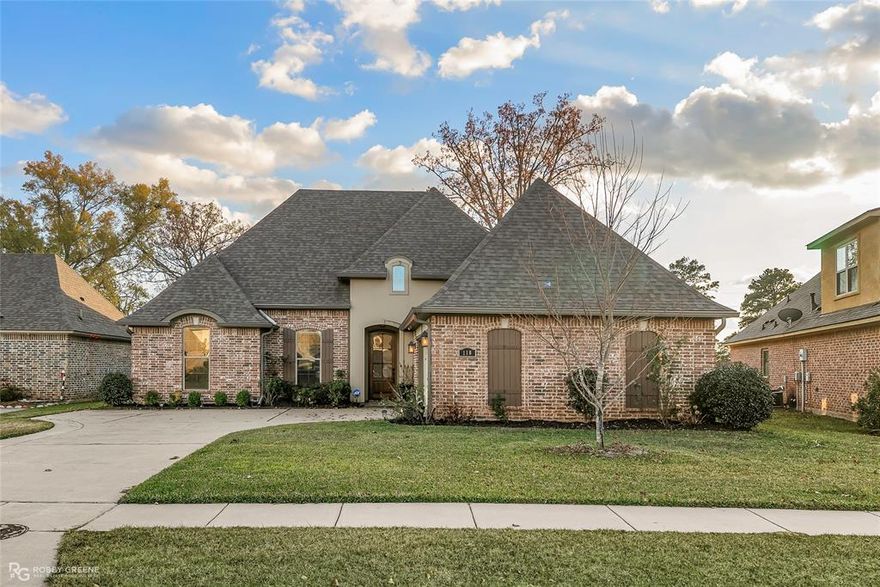 You will fall in love with this spacious home in Belmere. The living area has beautiful hardwood floors and a wood burning fireplace. This home has an open floor plan that is great for entertaining. There is a ton of cabinet space in the kitchen area. The primary bedroom is oversized and the primary bath has two vanities and a fantastic walk in closet. You will love the built in designated office area off the kitchen. The storage shed is perfect for all your needs.