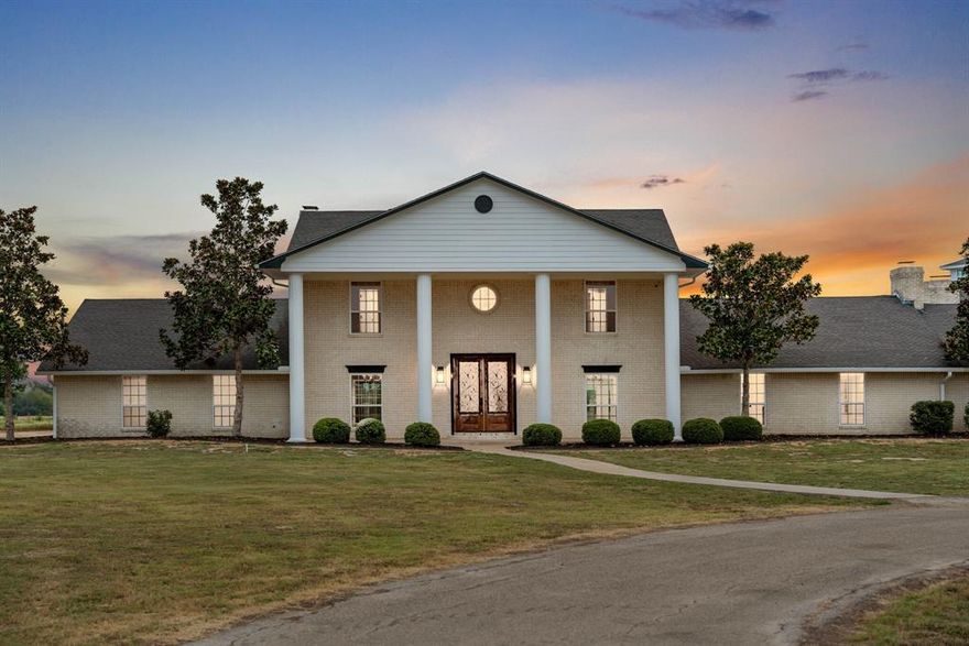Texas-sized opportunity meets unmatched versatility. Whether you envision a premier event center, luxury wedding venue, corporate retreat, or an extraordinary private residence built for unforgettable gatherings, this 12,000+ square foot estate on over 35 acres in Northeast Texas delivers on every level — just minutes from Paris.

Recently renovated and thoughtfully updated, this remarkable property blends grand-scale entertaining with refined country living in a way few properties can match.

The main residence features 5 bedrooms, 4 full baths, and 2 half baths, with expansive living and dining areas designed to host on any scale. Highlights include two sunrooms, a wet bar, walk-in pantry, media room or fitness studio, and an attached two-car garage with storm shelter. The layout offers impressive entertaining space while maintaining comfort and privacy for family or overnight guests.

A dedicated entertaining wing elevates the estate to venue status, complete with a grand ballroom, formal dining room, gathering room, kitchenette, full and half baths, and a dramatic spiral staircase leading to an upper-level living area with a private deck overlooking the grounds. This space is perfectly suited for weddings, receptions, galas, corporate events, and large-scale celebrations.

Outdoor amenities continue the resort-style experience with a fenced gunite pool, pool house featuring a full bath and utility room, and multiple areas designed for entertaining under the Texas sky. Additional improvements include a detached two-car garage, RV storage, and a separate office or workshop space.

The 35+ acres are fully fenced with improved pasture grass and a scenic pond, offering both beauty and functionality for recreation, livestock, or expanded event potential.

This is more than a home — it’s a destination property. A rare Northeast Texas showpiece that must be experienced in person.