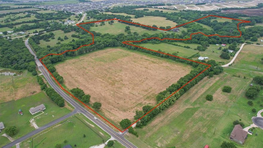 LOCATION! LOCATION! LOCATION! PRIME ACREAGE in the ever-growing City of McKinney, TEXAS. This property is heavily treed offering great upscale opportunities for developing City Lots, Estate lots or both. As a developer your New Subdivision or Investment Project can offer attractive options just minutes from the Historic Downtown McKinney. The City of McKinney has not missed a beat when it comes to investing in its growth and expansion, building this Historic Downtown District into a Destination, catering to both families and individuals looking for both Upscale or Relaxed Dining, Shopping and Entertainment. The new McKinney Airport, offering the Business Traveler additional attractive options, will be minutes away. McKinney Independent School District is Highly Rated and is the 2025 NICHE BEST OF SCHOOLS.
This Beautiful Canvas of Land can bring the Art of your Vision as a Developer to LIFE!! Numerous opportunities await for you to breathe life into  a New Community with Residential Living offering an array of amenities such as Pools, a Lagoon, Picnic Spaces, Pickel Ball Courts, Fishing Ponds and Walking Trails or Equestrian Style living with Homes, Horse Barns, Riding Trails and Equestrian Arenas with Stables or a 55  and over Community offering Senior Amenities and in close proximity to Baylor Scott and White and Medical City of McKinney . This new COMMUNITY TO BE offers easy access from Highway 5 and highways 380 and 121.