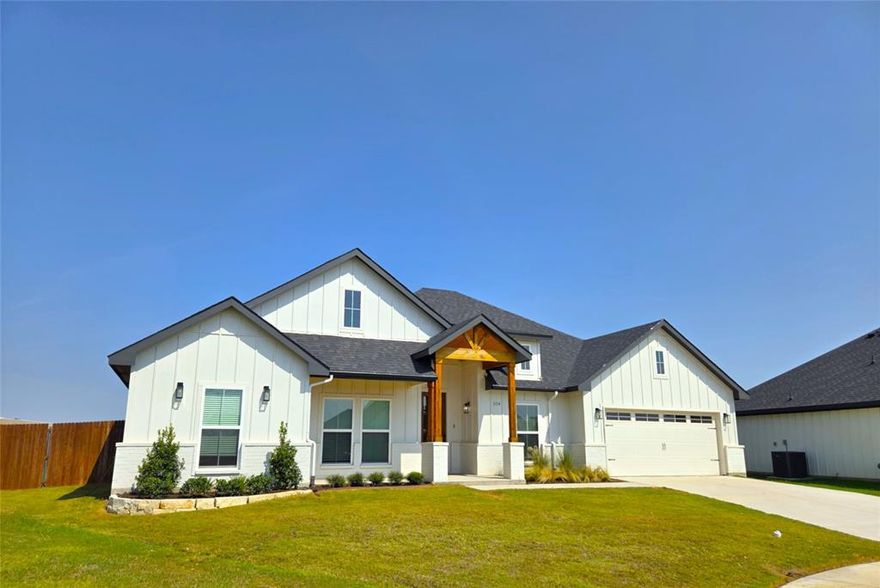 This beautiful modern farmhouse in one of Godley's finest neighborhoods, is practically new, and has almost everything you are looking for in a home. The Higher Links subdivision consists of only 49 lots giving it a very strong sense of community. Ideally located near downtown Godley and the Spring Market Grocery Store, the neighborhood is about 60 seconds from FM 917 then 6 short miles to the Chisolm Trail Toll Road. The home is situated on approximately a quarter acre lot in a quiet cul de sac backing up to an 11 acres farm so it is very quiet and peaceful. The open floorplan includes a roomy kitchen and living room layout with 3 bedrooms on one side of the house and a well appointed primary suite on the other. Also included is a spacious office in the front of the house, dining area off of the kitchen, mud room, and separate utility room off the garage. Additional amenities include island kitchen with granite countertops, stainless steel appliances, upgraded fixtures and hardware, large walk in closets, irrigation system, beautiful landscaping....and the list just keeps going on!  You really need to to come see this wonderfully designed and built home!
