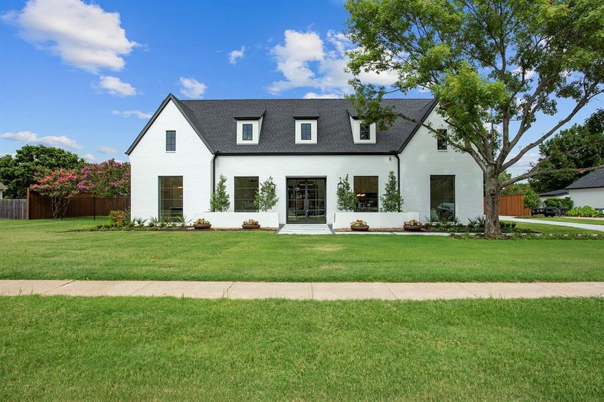 introducing a masterpiece of luxury living by Willowtree Custom Homes, featuring exquisite interior design by Susan Semmelmann Interiors. This newly constructed residence offers a custom design and a spacious backyard with an outdoor patio and entertaining area, perfect for hosting gatherings and enjoying the serene surroundings. Step inside to discover a chef's dream kitchen with a huge island, seamlessly open to a spacious living area, creating an inviting space for both entertaining and everyday living. The home boasts a formal dining area + custom wine storage, adding a touch of sophistication and elegance to the space. Retreat to the stunning primary suite, featuring a custom closet designed to elevate your daily routine and provide a sense of luxury and organization. An additional bedroom completes the downstairs while upstairs features two more large bedrooms, a loft, and a game room creating the perfect flex space.  Located in the award-winning Carroll ISD.