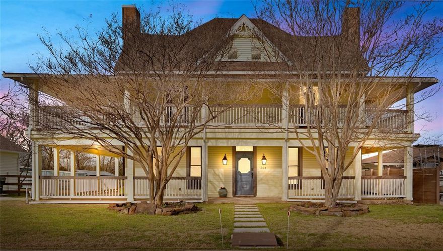 Historic Splendor Meets Modern Comfort! Upon entering this magnificent home, you are immediately struck by the harmonious blend of old-world craftsmanship and contemporary upgrades. The owners have undertaken a comprehensive renovation, which includes new plumbing, electrical, and HVAC systems. These essential updates ensure that the home meets the highest standards of comfort and efficiency while maintaining its historic integrity. The commitment to preserving the home's original character is evident in every corner. Special attention has been paid to the period details of the woodwork, trim, and accents. The intricate craftsmanship of the 1880's or early 1890's is showcased through beautifully restored doors, trim, crown moldings, custom beams and bead-board ceilings. Each room exudes a sense of history, with features that tell the story of a bygone era. In addition to the extensive updates & energy star appliances, the installation of new energy-efficient Anderson Windows stands out as a significant enhancement. These windows were thoughtfully integrated into the home's design, using the original hardwood details to maintain a seamless appearance. Not only do they provide superior insulation and reduce energy costs, but they also allow an abundance of natural light to flood the interiors, creating a warm and inviting atmosphere. You'll love an array of spacious and versatile living areas, ideal for both relaxation & entertainment. The main floor features a grand living room with a stunning fireplace, perfect for cozy evenings. Adjacent to the living room, the formal dining room boasts an elegant double sided fireplace with antique mantel setting the stage for memorable dinner parties. The kitchen is a chef's dream, complete with modern appliances, over 36 ft of floor to ceiling custom cabinetry, plus a large center island. Escape to the 2nd floor media room or wrap around porch & deck. Storage is abundant with a 3rd floor attic space or the huge 25x28 ft garage.