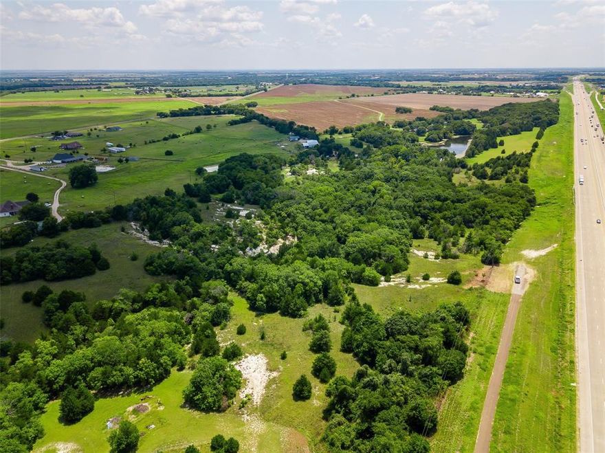 Prime 13.51-Acre Tract with I-35S Frontage – Italy, TX

Exceptional opportunity to own 13.51 acres with high-visibility frontage along I-35S, just minutes from charming downtown Italy and within easy reach of Waxahachie, Hillsboro, and the DFW Metroplex. This versatile property offers excellent potential for residential or agricultural use . The terrain makes building simple, while the convenient interstate access ensures quick travel in any direction. Whether you envision a homestead, small farm, or investment property, this land is a blank canvas ready for your plans. Don’t miss your chance to secure acreage in a fast-growing corridor!