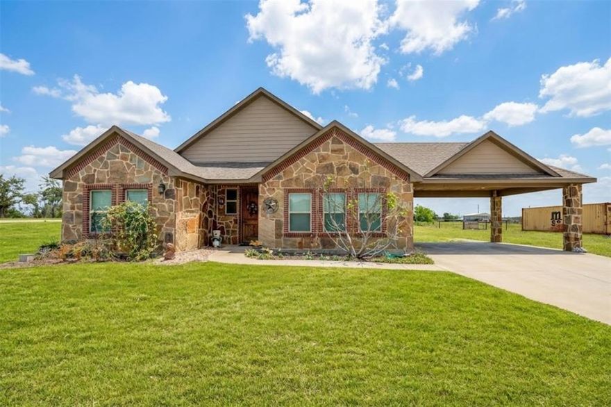 Spacious country living just outside the city limits! This 5-bedroom, 3-bathroom home sits on a desirable corner lot with over an acre offering the prefect blend of comfort, space and functionality. Inside, you'll find a flexible floorpan with beautiful tile flooring and custom woodwork throughout. Bedroom number 1 would make the perfect home office or a crafters dream space as this is the only bedroom with tile flooring, all other bedrooms feature carpet. Step outside and enjoy the freedom that comes with owning a piece of land in the fast growing Trenton Texas with minimal restrictions and endless possibilities. Orduna offers covered parking plus a 30x40 steel frame shop with electric, all connected with a smooth concrete drive. This space is tall enough for RV storage with plenty of room for the boat and any other outdoor toys you might have! Come take a look at this wonderful property and be settled in before summer gets here!