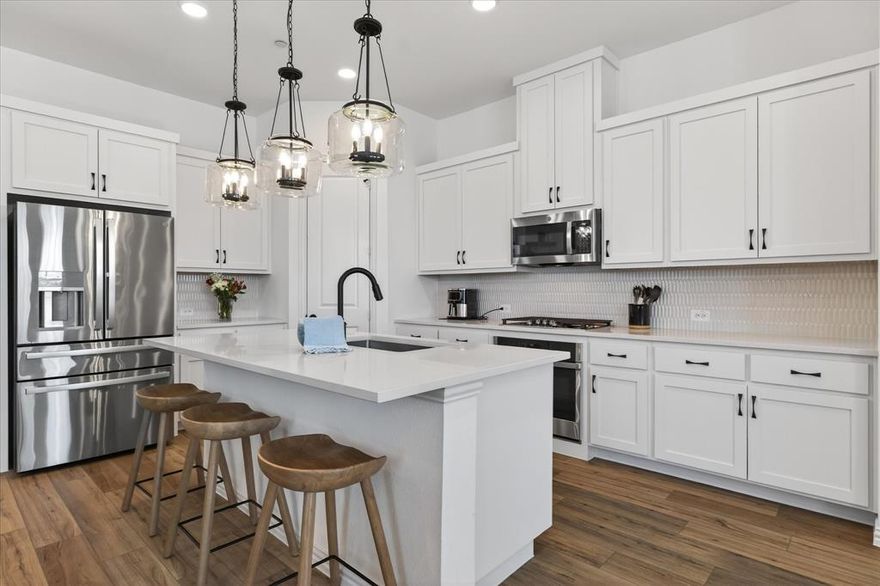 Make an offer on this gorgeous townhome designed for the way you actually want to live. This beautifully maintained two-story offers 3 bedrooms, 2.5 baths, and nearly 2,000 square feet of functional, light-filled space that feels both open and inviting from the moment you enter.    The main level is all about connection. An effortless open-concept layout brings the kitchen, dining, and living areas together, creating a space that works just as well for everyday living as it does for hosting. Natural light fills the home, giving it a warm, welcoming feel throughout the day.   Upstairs, flexibility takes center stage. The oversized loft offers endless possibilities—whether you need a second living area, home office, game room, or creative space, this area easily adapts to your lifestyle. The private primary suite provides a quiet retreat, while additional bedrooms offer comfort for family, guests, or whatever life calls for next.   And then there’s the location. Just one block from George Bush Turnpike, you’re positioned for convenience without sacrificing the feel of a neighborhood setting. Quick access to major highways, shopping, dining, and surrounding cities means less time commuting and more time living.