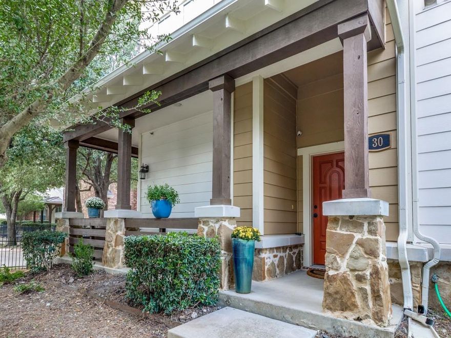 Incredible and rare three bedroom, three and ½ bath townhome, boasting just under 2200 square feet in Lakewood, near all that is great in Dallas's best urban neighborhood! On the quiet side of the Stratford at Lakewood condos, with an inviting wraparound porch greeting you at the front entry, you find open concept living, with tall ceilings and transom lighting offering bright interiors. The master is down with spacious bath and walk-in closet, with two additional bedrooms as well as second living and office upstairs. This end unit lives like a spacious home with like amenities including attached two car garage with epoxy flooring, balcony off second floor living and ensuite baths on both secondary bedrooms. Monthly HOA includes gas, water, landscaping, trash pickup and maintenance of common areas. Don't miss the opportunity to get into an incredible space for an incredible price, with all that this wonderful neighborhood has to offer just minutes from downtown Dallas and Lakewood shopping center!