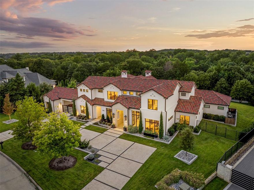 INCREDIBLE DeCavitte Santa Barbara–style estate on a full acre, perfectly positioned against a tranquil nature preserve and trails in the highly desirable gated community of Terra Bella. This architectural masterpiece blends timeless elegance with modern livability, offering 5 spacious bedrooms, 5.2 luxurious baths, and a 4-car garage. Every detail has been thoughtfully curated, from soaring ceilings to designer wallpaper and custom light fixtures that create an atmosphere of sophistication throughout. The chef’s kitchen, open to the family room, is a dream for both cooking and entertaining, featuring Wolf and Sub-Zero appliances, dual dishwashers, a Miele coffee maker, soft-close cabinetry, quartz countertops, and a generous island. Wide-plank European white oak floors and a dramatic modern staircase add to the home’s refined style. The owner’s suite is a private retreat with a spa-like bath, morning bar, exercise room, and oversized closet. A first-floor media room and game room seamlessly connect to the outdoor sanctuary, where a sparkling Claffey pool and spa, turf lawn for low maintenance, and a fire pit create the perfect setting for year-round enjoyment. Families may also enroll in Exemplary Carroll ISD or Westlake Academy IB World school.