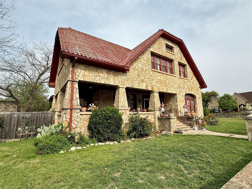 Originally built as a large Victorian frame house in the 1890s, it was replaced in 1933 by the town doctor’s dream of a magnificent 15-room two story stone home. Letters describe his pride in the construction and appearance of the grand architecture and materials.  Truly opulent for the time. Features new AC unit, updated plumbing and new wiring. The house sits on more than half an acre, a sprawling corner lot in the heart of downtown, bordered by a matching hand laid rock wall. It features an adjacent 3-car garage, which is attached to a separate cavernous 1890s rock building that was once a grainery feed mill. That building itself is 1428sq ft with endless possibilities for someone with vision. This is indeed a one-of-a-kind property.
