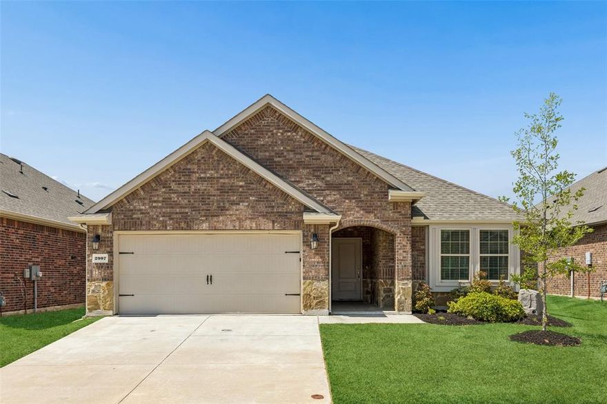 Welcome to this pristine east facing single-story home offering turnkey comfort, charming curb appeal, and access to resort-style amenities that make every day feel like a getaway.

Step inside to a thoughtfully designed, light-filled open floor plan—perfect for both everyday living and effortless entertaining. The stylish white kitchen is a true centerpiece, featuring stainless steel appliances, a spacious pantry, shaker-style cabinetry, designer backsplash, and durable wood-look tile flooring that seamlessly flows through the dining and main areas of the home.

The split-bedroom layout provides ideal privacy, with a serene primary suite tucked away from the secondary bedrooms. Enjoy a spa-like ensuite complete with a walk-in closet, walk-in shower, and a large soaking tub—perfect for relaxing at the end of the day.

Additional highlights include smart home features such as a front door camera and lock system for added convenience and peace of mind.Larger fully fenced backyard with plenty of grass space for a trampoline, playscape, or a garden for all you green thumb enthusiasts. Quick access to major routes & an array of entertainment, shopping, restaurants, and trendy hot spots to enjoy! Come make this gem your perfect home sweet home!