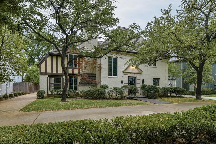 This charming collaboration between noted architects Charles Dilbeck and George Marble is waiting for the right buyer to restore it to its original beauty! The first Park Cities home designed by both famed architects shows the special details for which Dilbeck-designed homes have come to be known. The entry is flanked by a curving staircase illuminated by a vertical window at the front of the home. Upstairs are 3 bedrooms & two baths and a large living area beyond them. Downstairs is a spacious dining area with lovely plaster walls and curved ceiling edges. The formal living, with a lovely wood-paneled fireplace & plaster walls, opens to a cozy study. A number of years ago, the owner added a primary bedroom & bath downstairs off a spacious den opening to the back yard. This opportunity to preserve a piece of history must be seen to be appreciated. Restored, it will be right at home with the rest of the architectural beauties on Beverly Drive! The home is an estate and to be sold as-is.