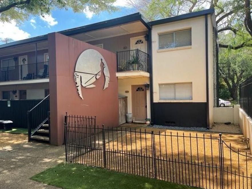 Great location nestled among some of Dallas finest homes! This unit has its own fenced front yard and private patio! Totally updated with granite counters, travertine tile, hardwood floors, and stainless steel appliances. 2nd bedroom could be used as a study. Washer and dryer included! Covered parking and lovely grounds that include a great patio area. Close proximity to the Park Cities, local shopping, dining and nightlife! Property on corner of Hawthorne and Throckmorton. Pet rent is $40 per month.