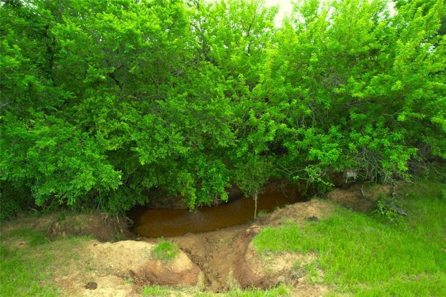 PRICE REDUCTION
Best of both worlds! Have your own hunting and agriculture property, while the convenience of being just minutes away from town. This beautiful 41.4 acre tract is located just 2 miles from the quiet, friendly, and small town of Nocona, TX. The dead-end county road makes for very convenient and secluded access while remaining  just outside of city limits. 
This raw property has lots of potential for building your dream home with availability to utilities and plenty of acreage. The pasture land creates a great opportunity to run livestock. And the flowing creek and abundance of hardwoods create a perfect environment for wildlife and hunting. This property is full of opportunities, including a great investment venture in a piece of North Texas with the ability for tax exemptions. 


For additional information, contact Zane Kemp:
940-634-1998
zkemp@mossyoakproperties.com